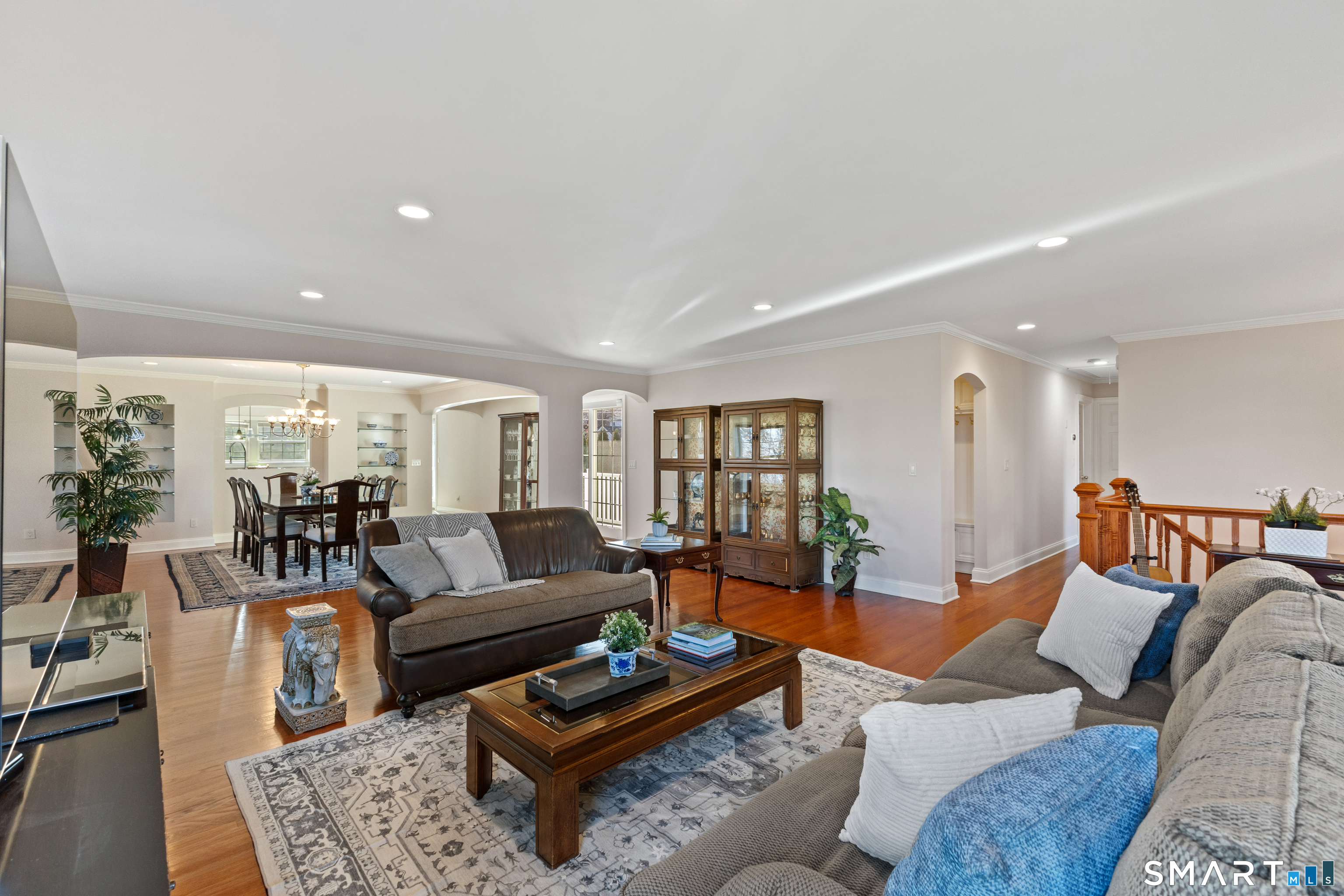61 Hobson Street Stamford, CT 06902 - Photo 7 of 36 a living room with furniture a rug and a table