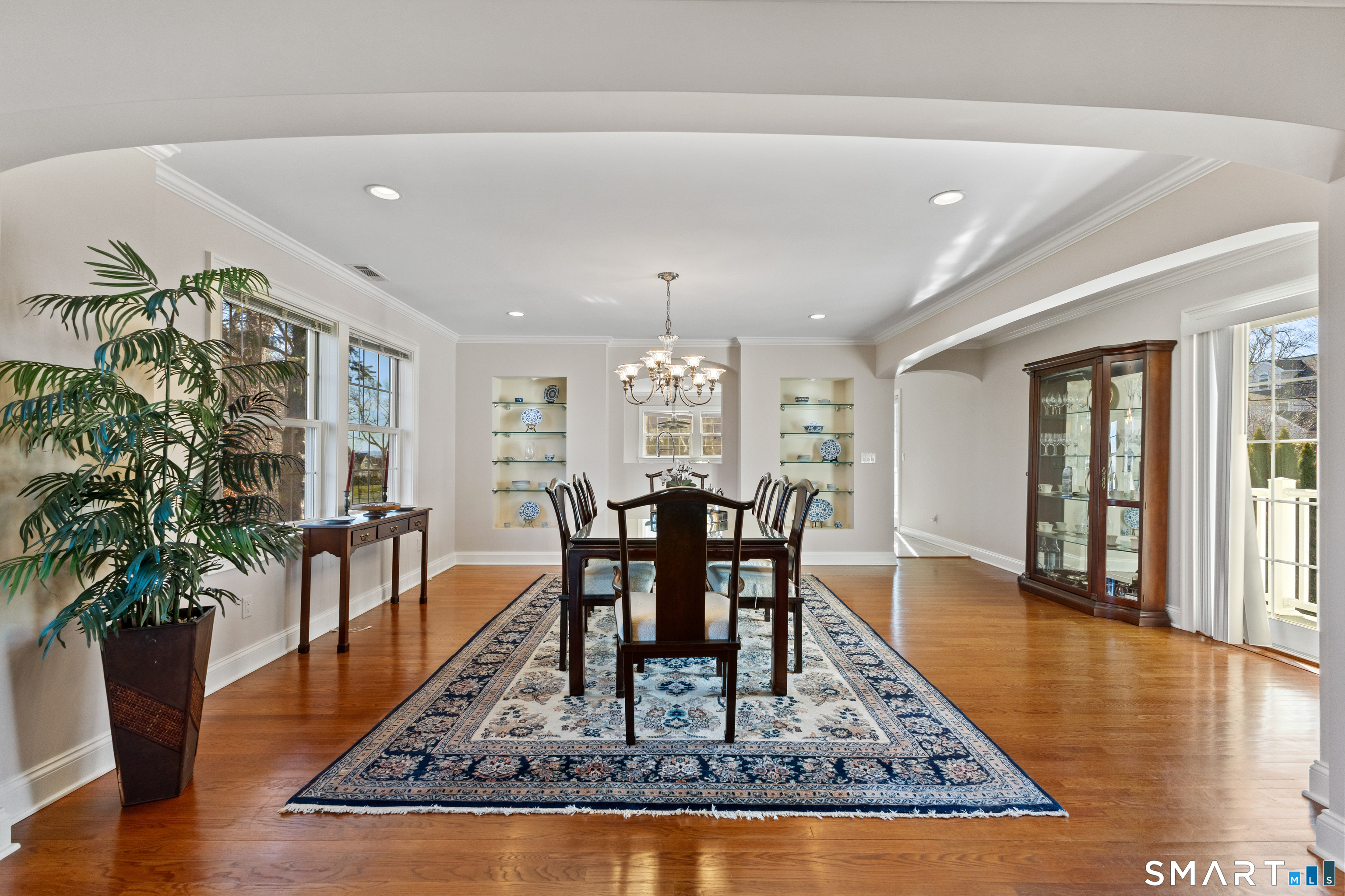 61 Hobson Street Stamford, CT 06902 - Photo 9 of 36 a view of a dining room with furniture window and wooden floor