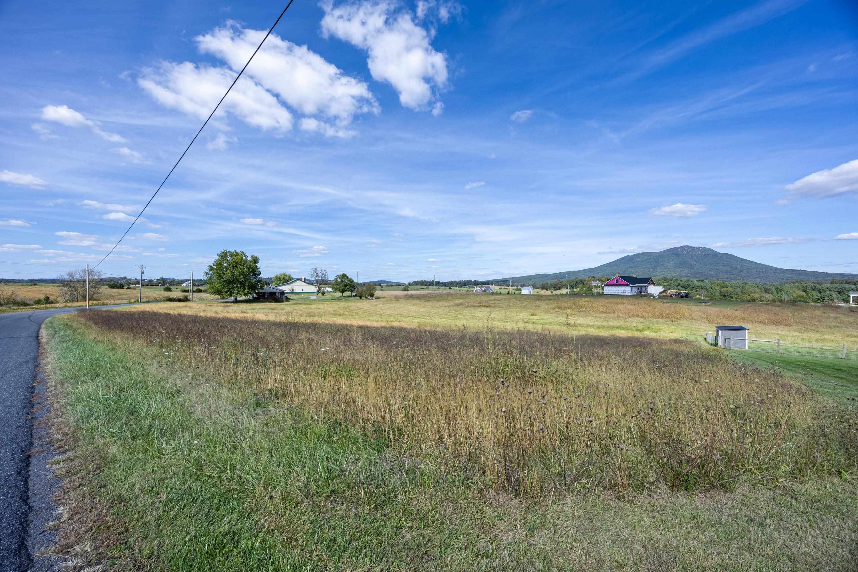 6165 Oak Shade Road Penn Laird, VA 22846 - Photo 20 of 20 a view of a lake with a city