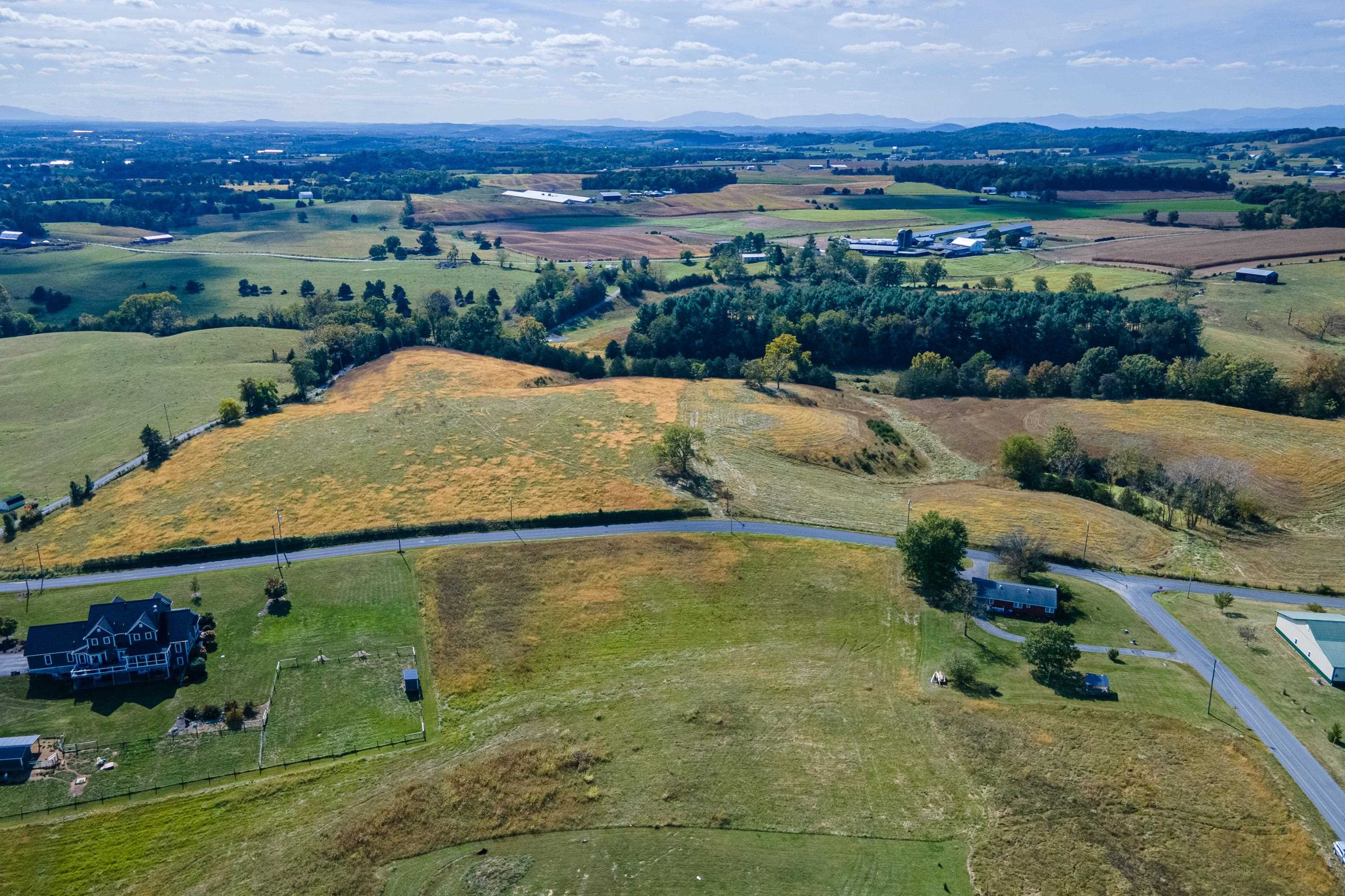 6165 Oak Shade Road Penn Laird, VA 22846 - Photo 5 of 20 an aerial view of a house with a yard