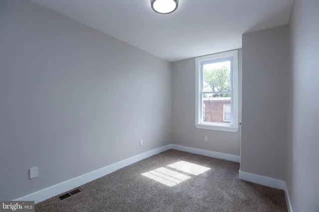 an empty room with a window