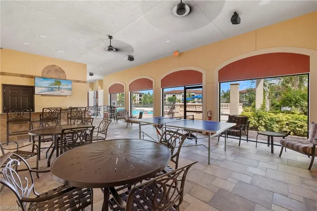 an outdoor space with furniture hardwood and a table
