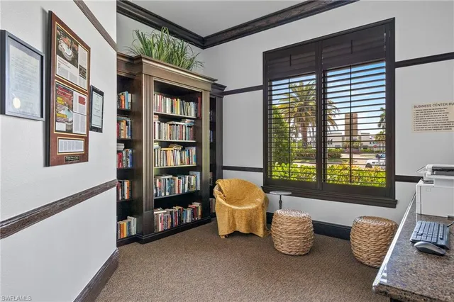 a view of a living room and dining room