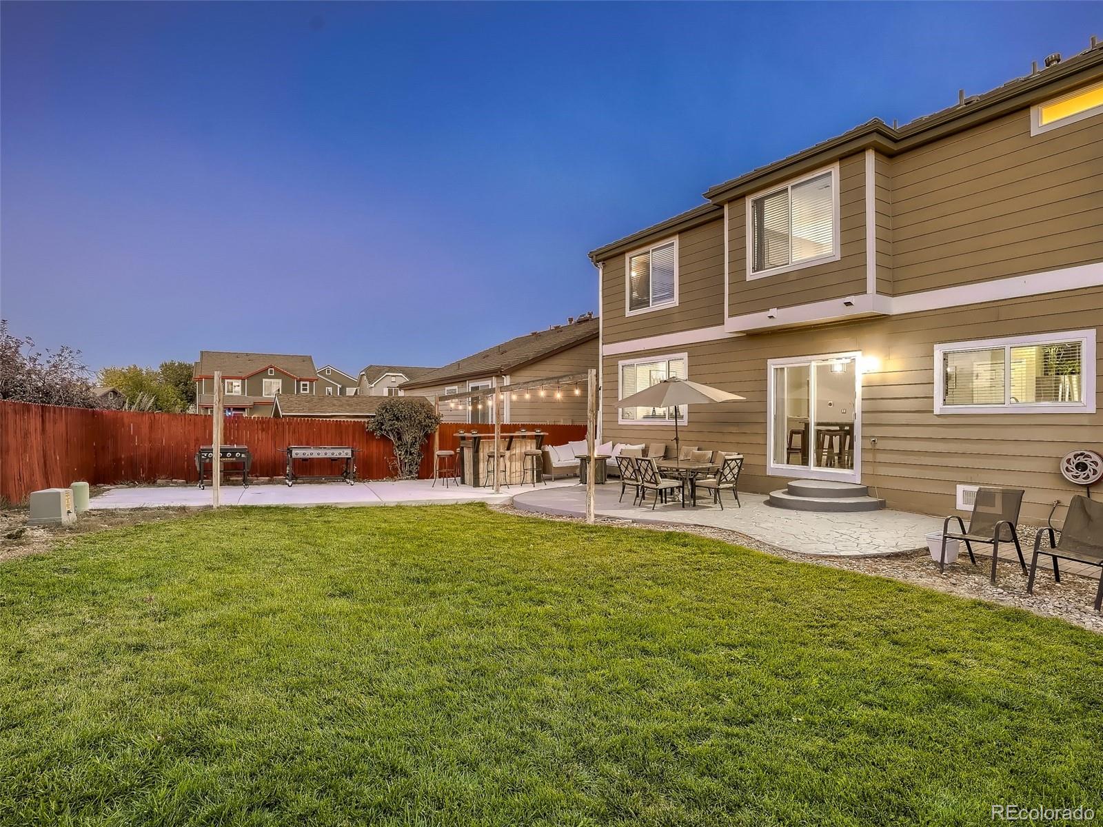 10047 Crystal Circle Commerce City, CO 80022 - Photo 26 of 28 a view of a fountain with a big yard