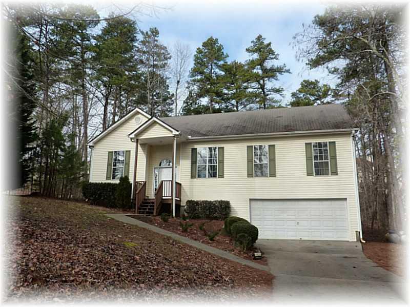 3155 Carlton Road Cumming, GA 30041 - Photo 1 of 1 Exterior Front. Natural setting in a terrific lake community minutes from downtown Cumming and GA400 and within walking distance of the lake