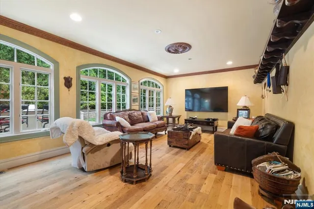 a spacious bedroom with a bed and a couch