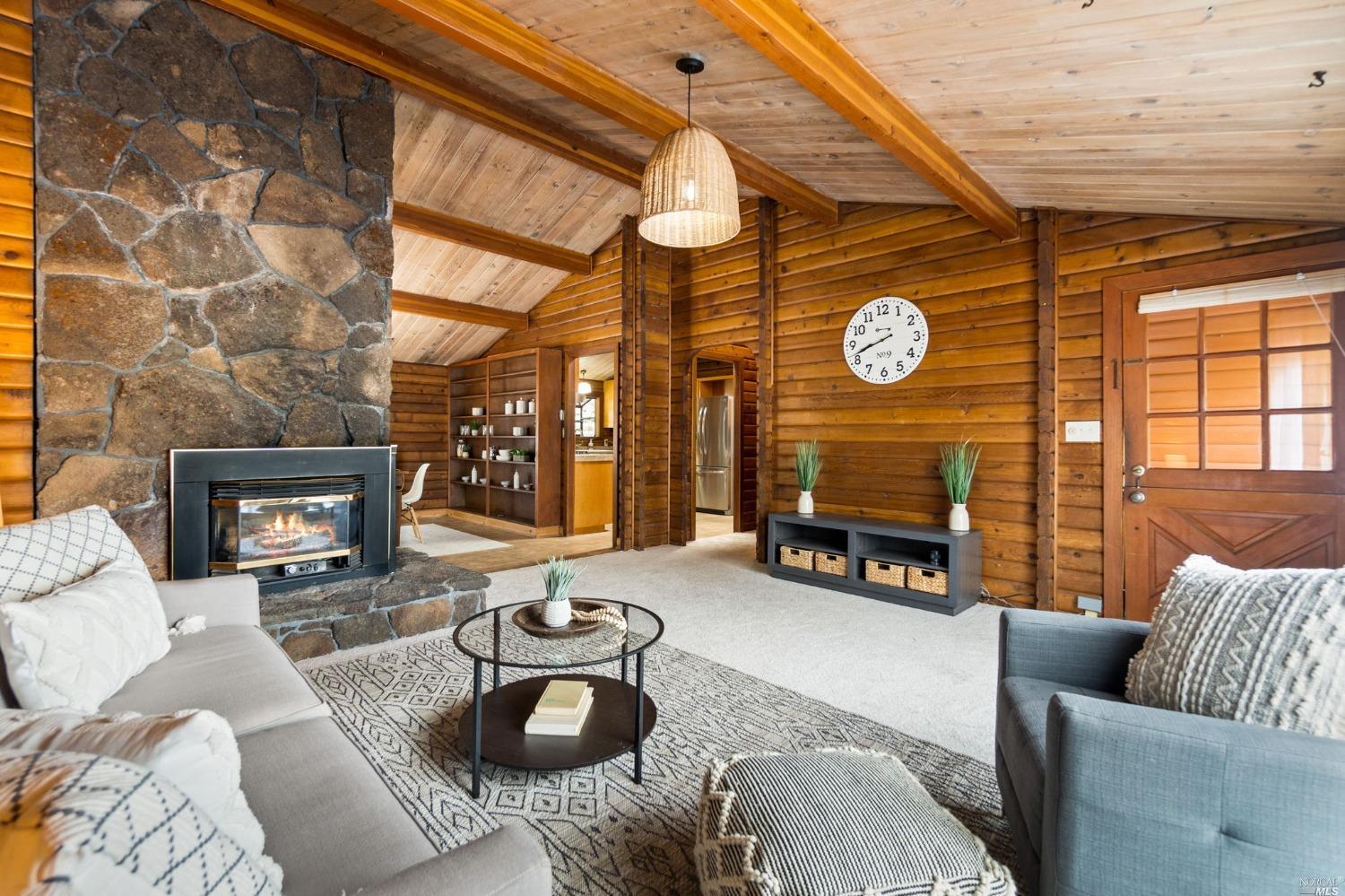 101 Orange Street San Rafael, CA 94901 - Photo 1 of 1 a living room with furniture a fireplace and a large window