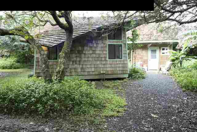 160 Door Of Faith Road Haiku, HI 96708 - Photo 20 of 21 a view of a house with a yard and potted plants