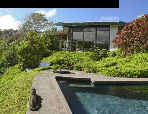160 Door Of Faith Road Haiku, HI 96708 - Photo 3 of 21 a front view of a house with a yard