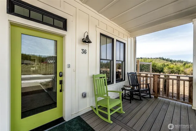 a view of balcony with furniture