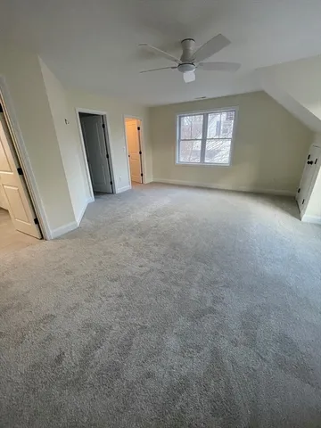 a view of empty room with windows