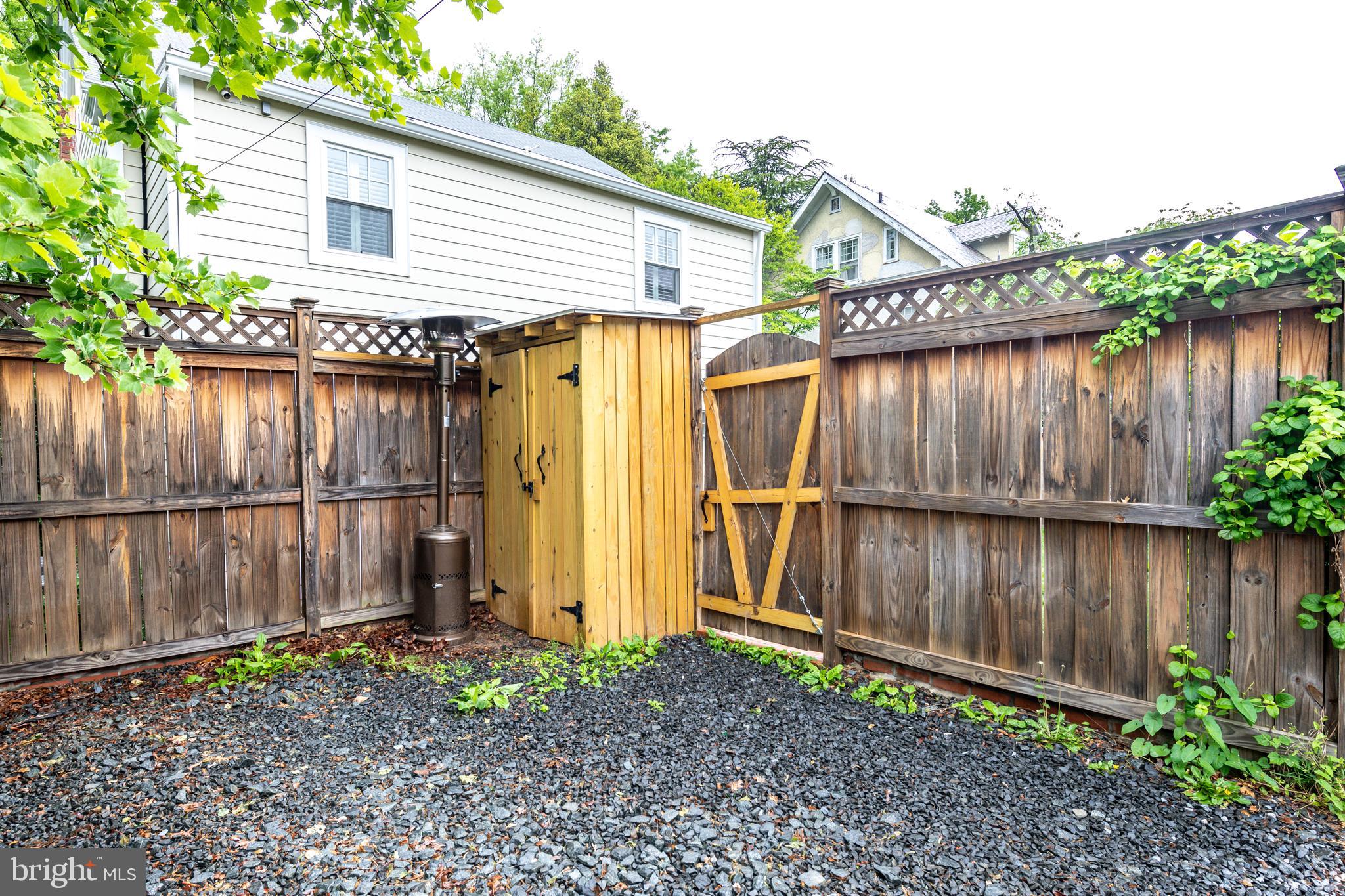 3806 Military Road Northwest Washington, DC 20015 - Photo 48 of 50 1+ car rear parking pad with storage shed