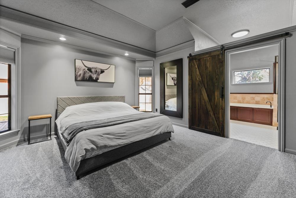 3358 Altruria Road Bartlett, TN 38135 - Photo 15 of 28 a spacious bedroom with a bed and a large mirror