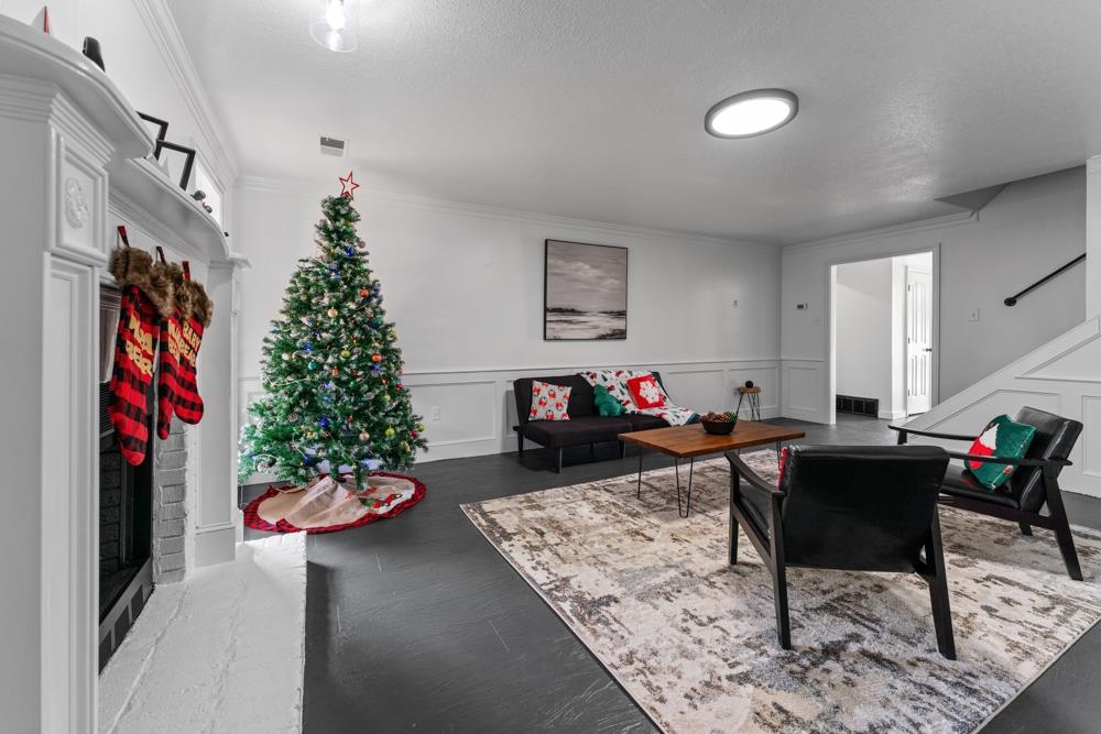 3358 Altruria Road Bartlett, TN 38135 - Photo 6 of 28 a living room with furniture and a fireplace