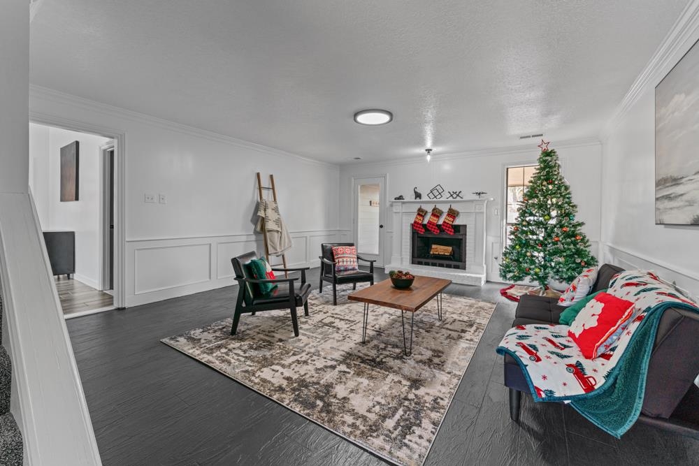 3358 Altruria Road Bartlett, TN 38135 - Photo 7 of 28 a living room with furniture and a fireplace