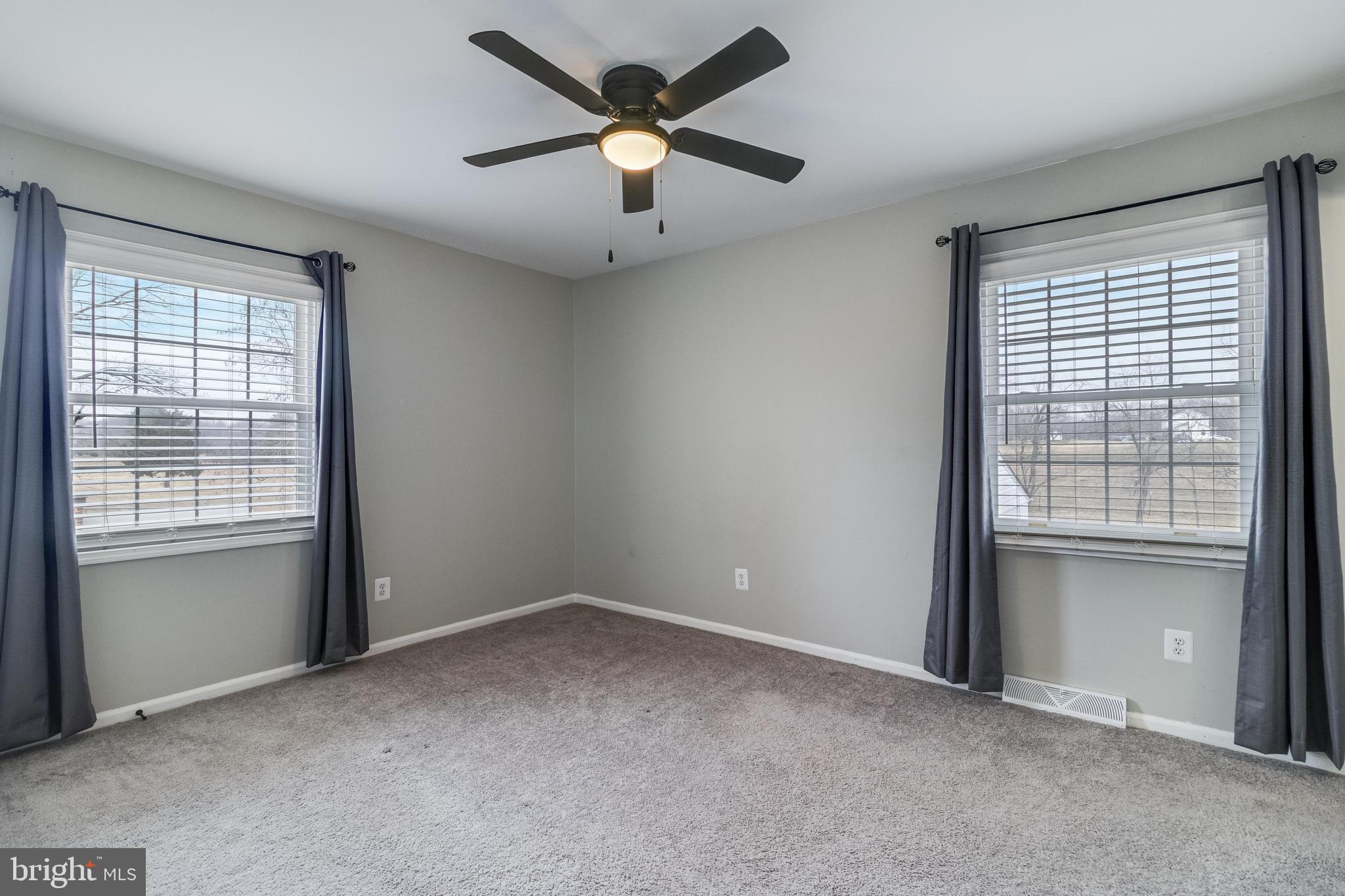 5510 Raphael Drive Pomfret, MD 20675 - Photo 7 of 10 a view of an empty room with a window