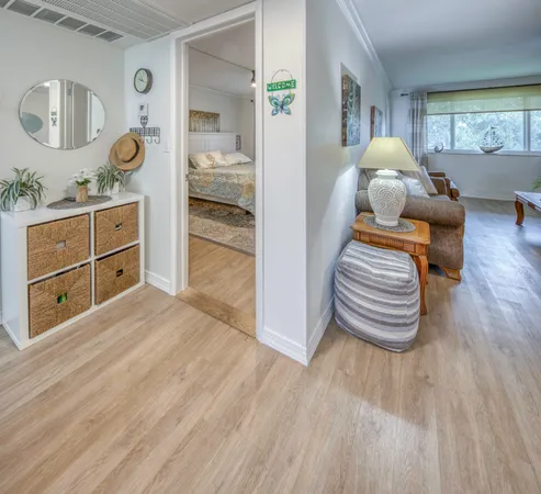 a room with a bed and furniture