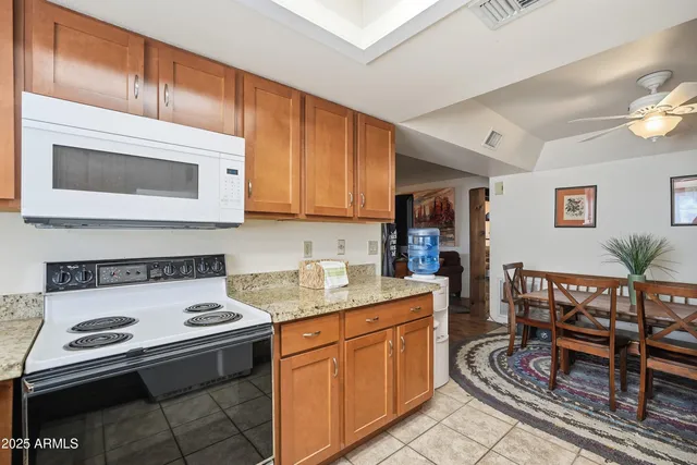 a kitchen with a stove and a microwave