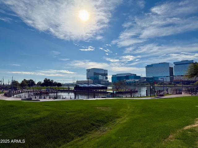 a view of a big yard with table and chairs