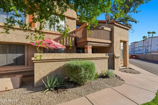 a view of a street with sitting area
