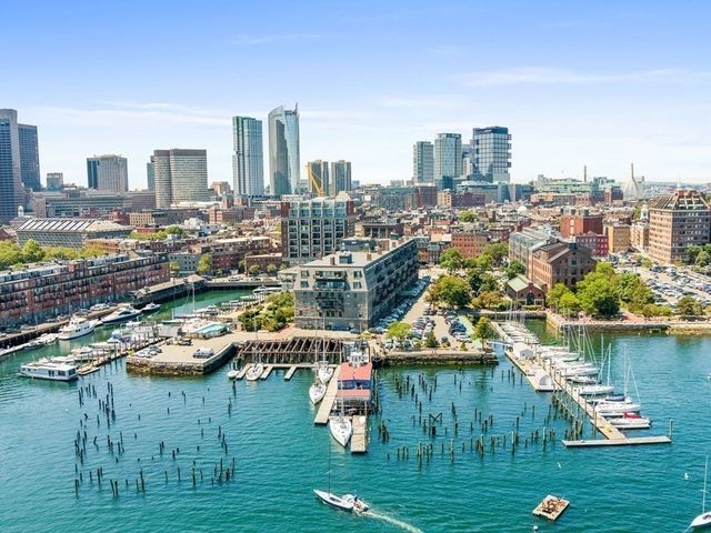 a view of a city and lake