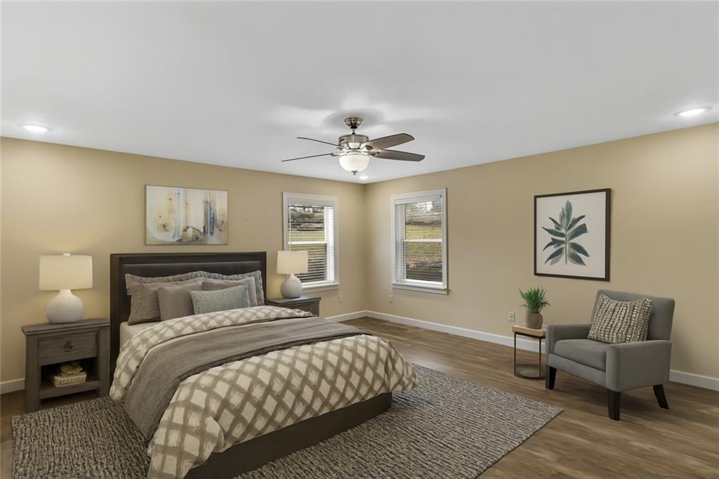 1225 Mercer Road Ellwood City, PA 16117 - Photo 14 of 36 The primary bedroom is a true retreat with room to spare.