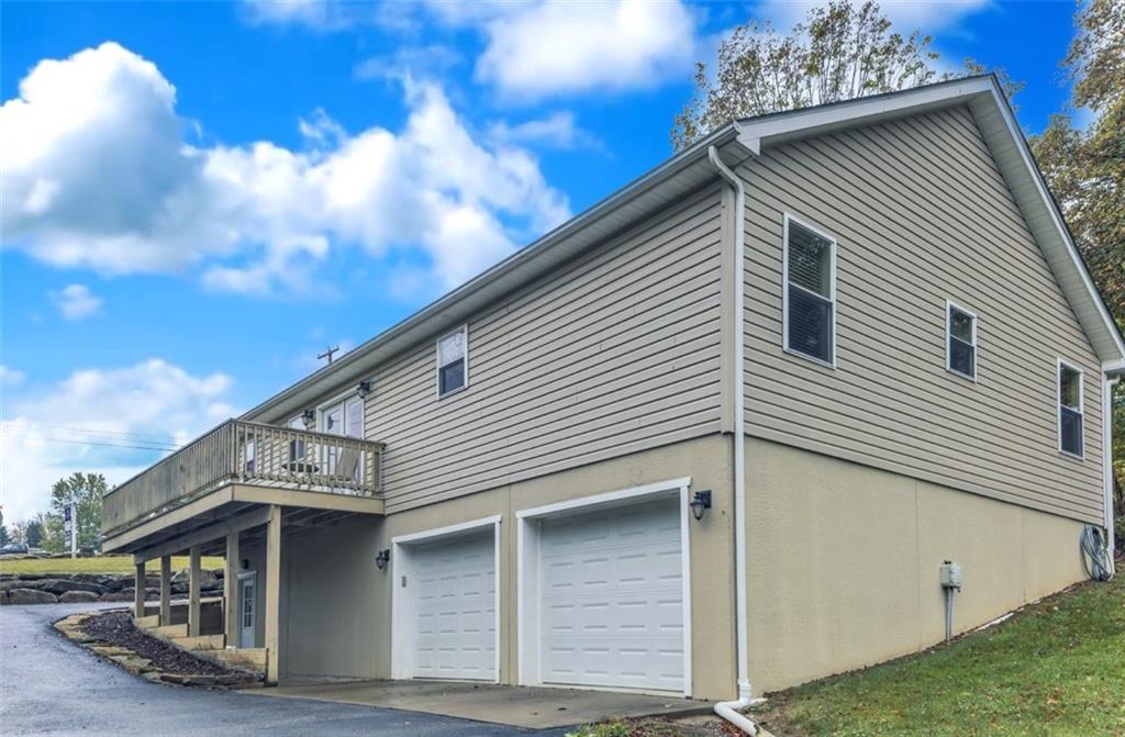 1225 Mercer Road Ellwood City, PA 16117 - Photo 33 of 36 The garage is a convenience you'll soon never want to live without!