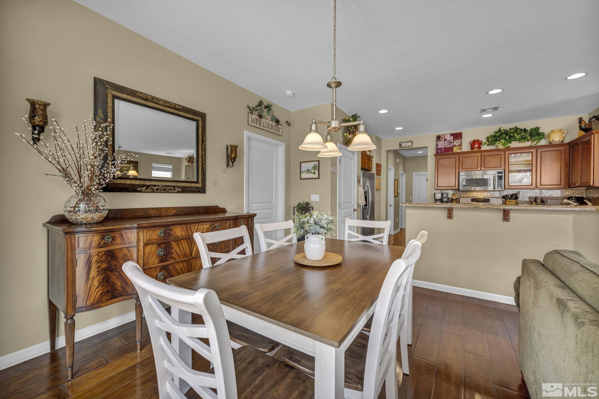 1925 Trail Creek Way Reno, NV 89523 - Photo 19 of 39 a view of a dining room with furniture and wooden floor