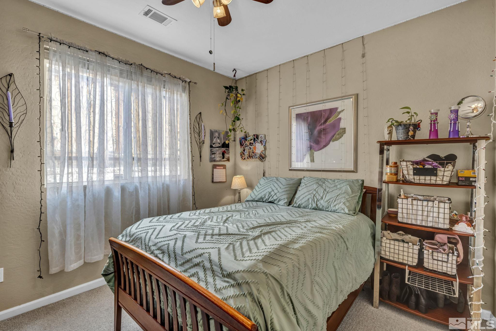 1925 Trail Creek Way Reno, NV 89523 - Photo 22 of 39 a bedroom with a bed and a window