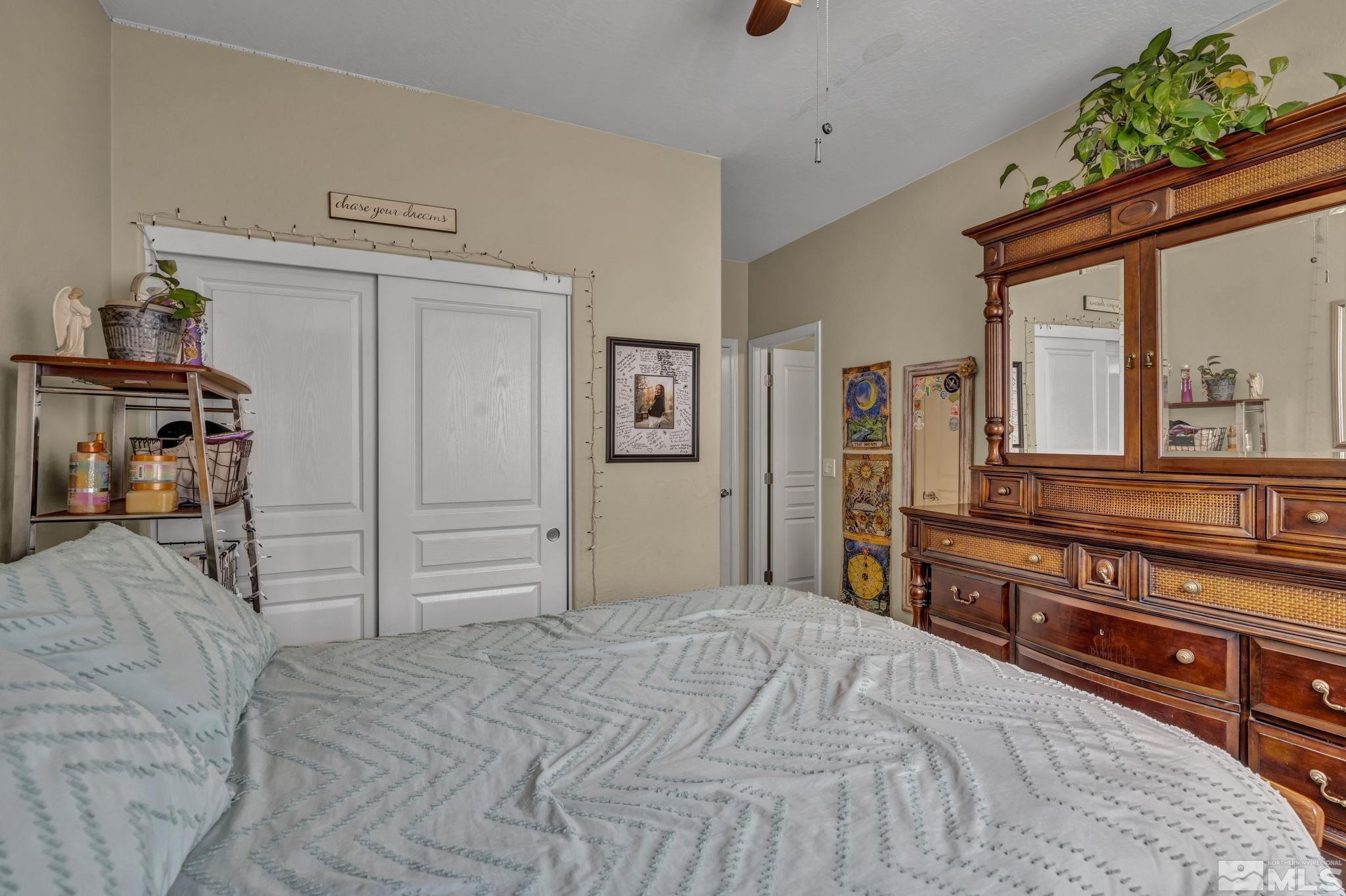 1925 Trail Creek Way Reno, NV 89523 - Photo 23 of 39 a bedroom with a bed and a dresser