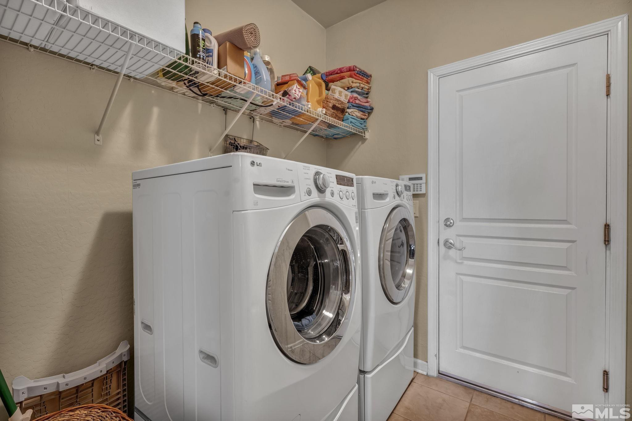 1925 Trail Creek Way Reno, NV 89523 - Photo 24 of 39 a utility room with dryer and washer