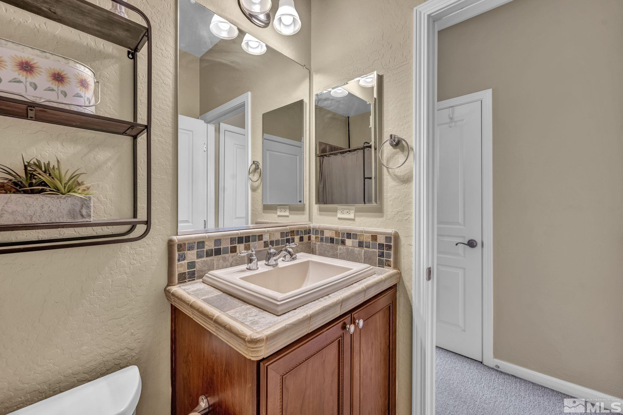 1925 Trail Creek Way Reno, NV 89523 - Photo 26 of 39 a bathroom with a sink and a toilet