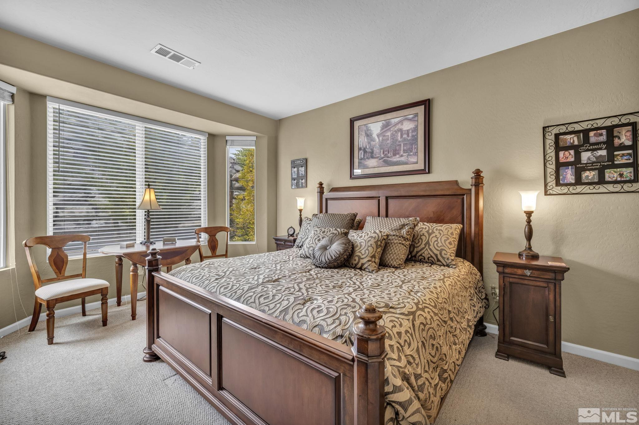 1925 Trail Creek Way Reno, NV 89523 - Photo 27 of 39 a bedroom with a bed and a couch