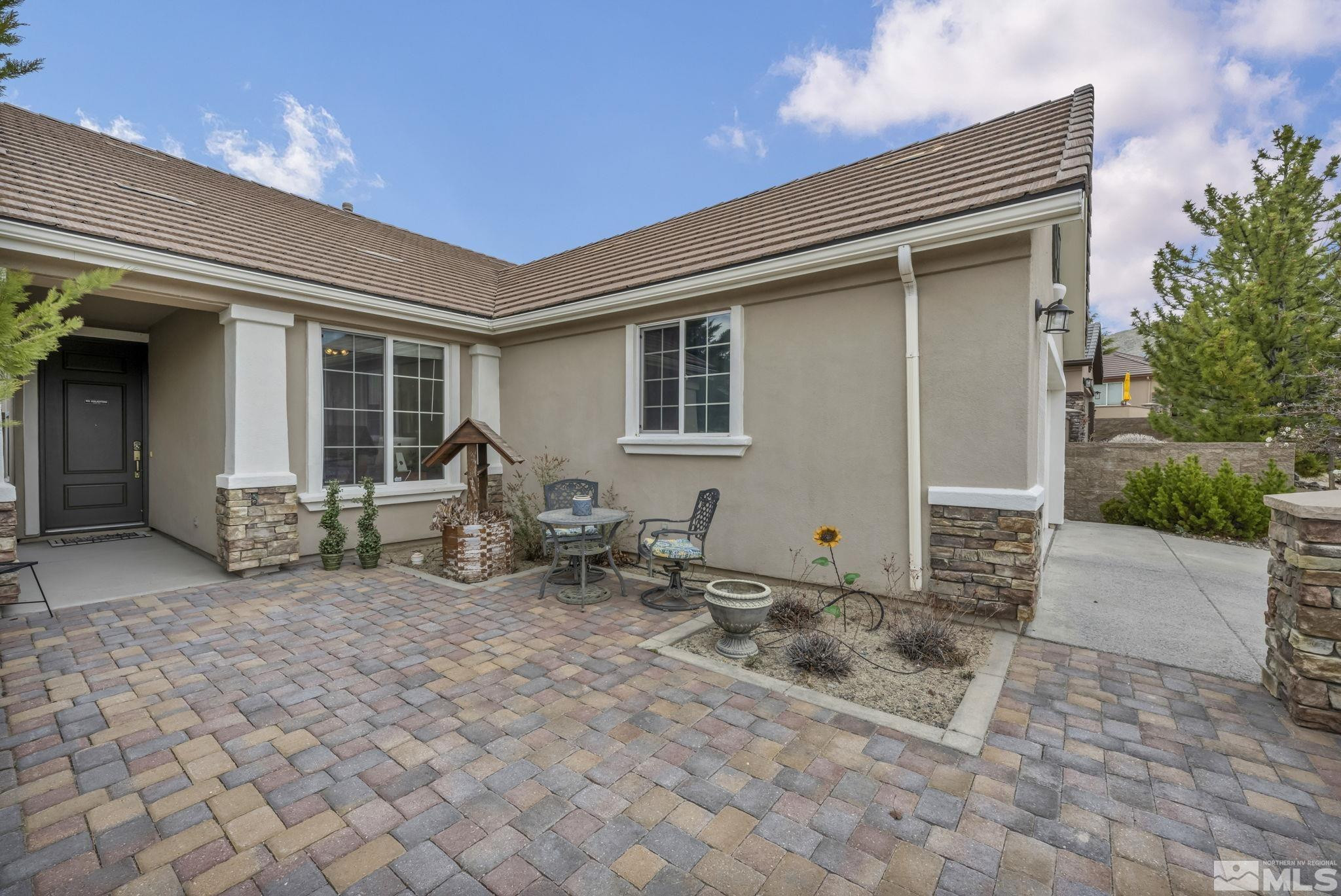 1925 Trail Creek Way Reno, NV 89523 - Photo 5 of 39 a backyard of a house with seating space