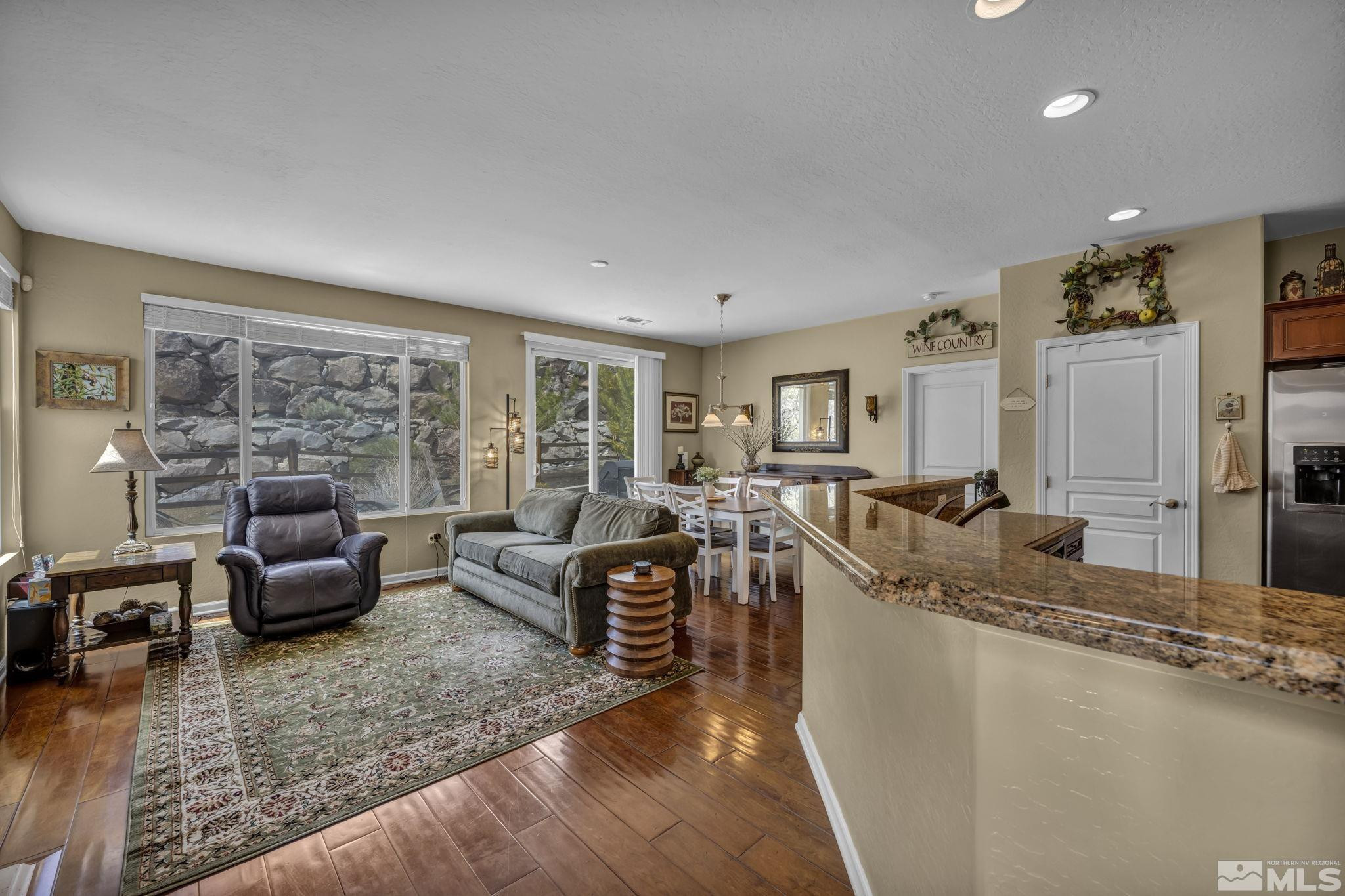 1925 Trail Creek Way Reno, NV 89523 - Photo 7 of 39 a living room with furniture and a large window