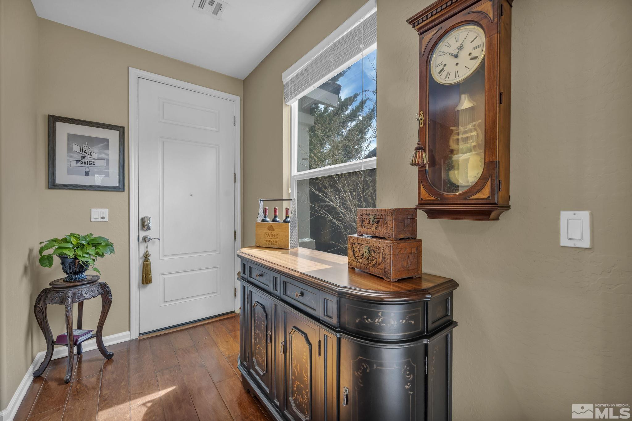 1925 Trail Creek Way Reno, NV 89523 - Photo 9 of 39 a dining room with table chairs and wooden floor