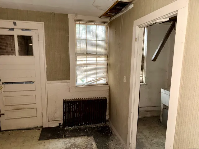 a view of a livingroom with a fireplace