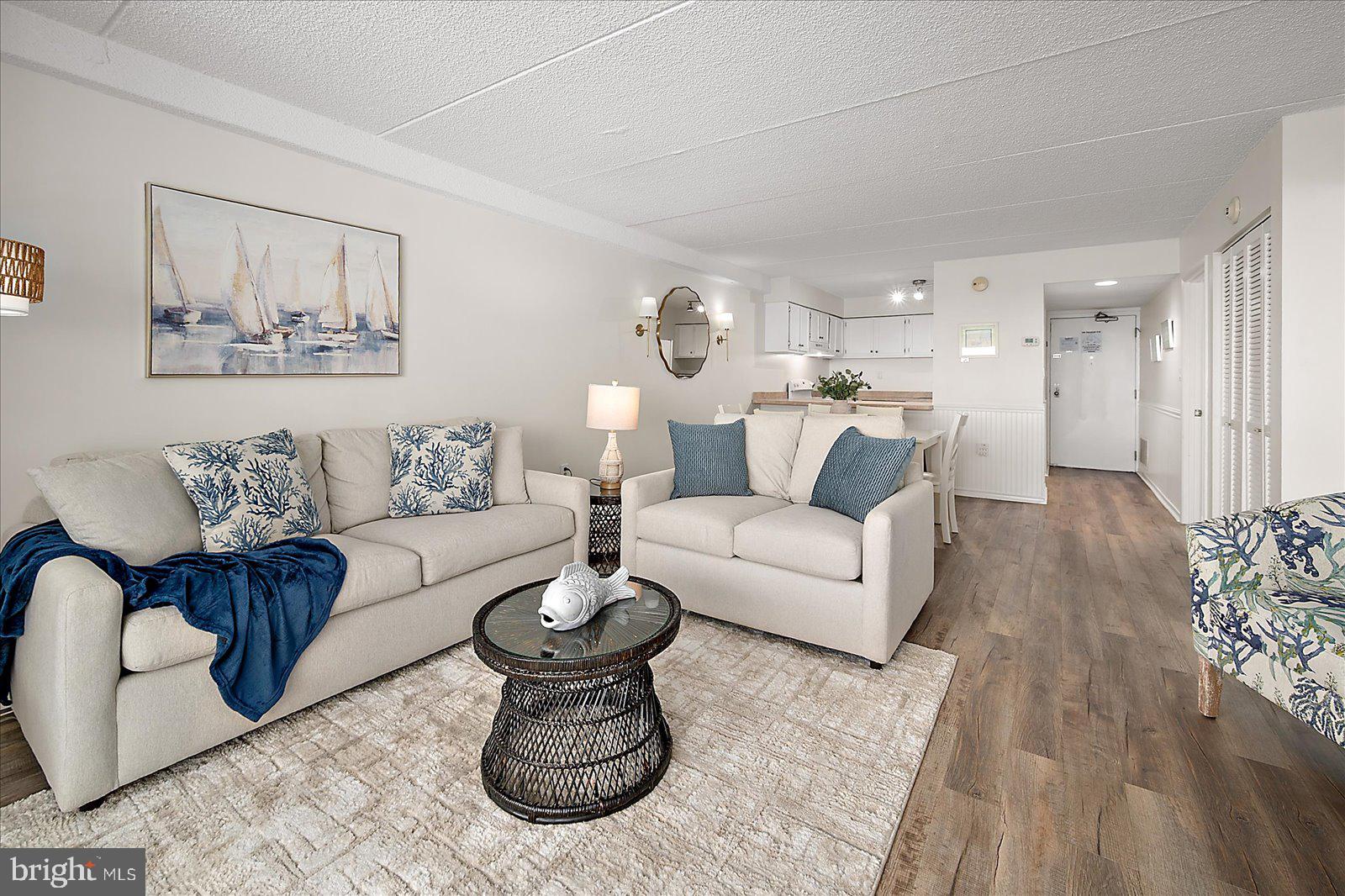 10300 Coastal Highway, Unit 1808 Ocean City, MD 21842 - Photo 11 of 47 a living room with furniture