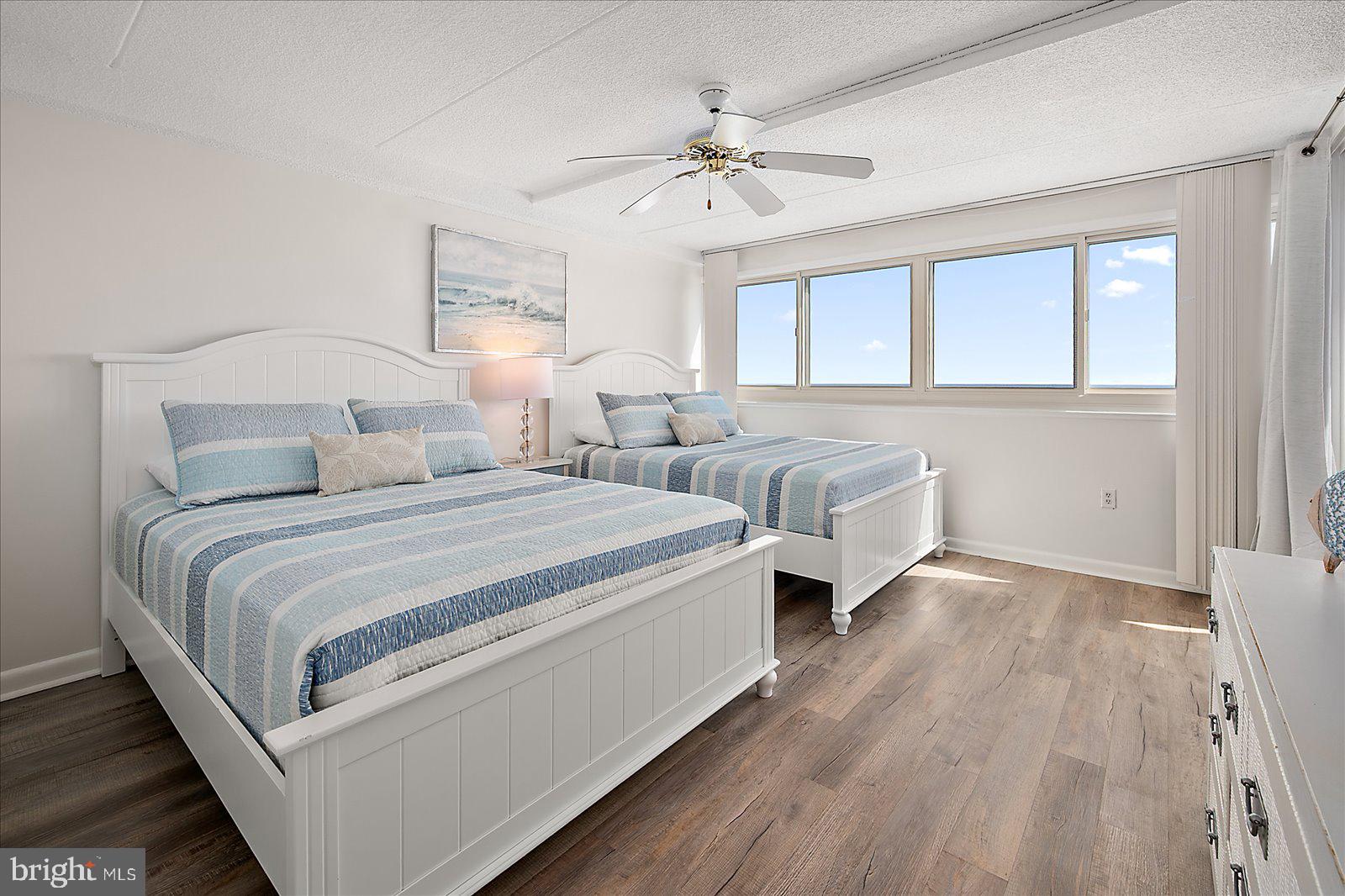 10300 Coastal Highway, Unit 1808 Ocean City, MD 21842 - Photo 22 of 47 a bedroom with double bed and a window