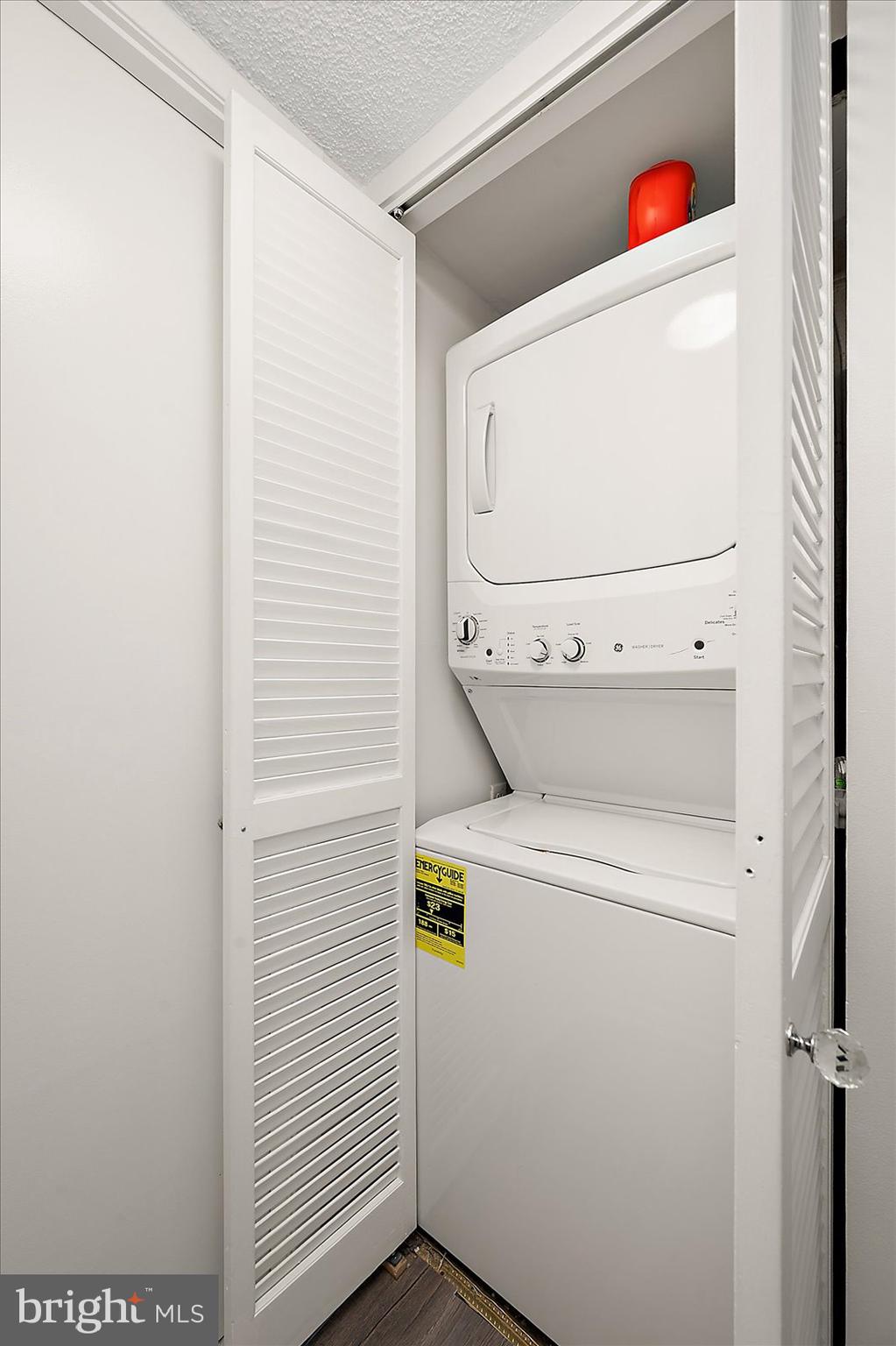 10300 Coastal Highway, Unit 1808 Ocean City, MD 21842 - Photo 41 of 47 a utility room with dryer and washer