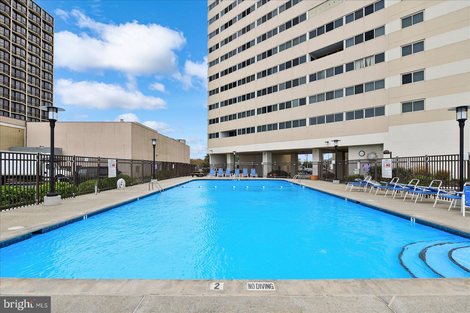 10300 Coastal Highway, Unit 1808 Ocean City, MD 21842 - Photo 42 of 47 a view of building with swimming pool