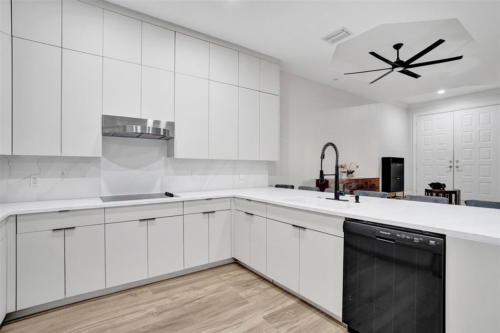 230 Northeast 69th Circle, Unit 230 Boca Raton, FL 33487 - Photo 11 of 91 a kitchen with a sink cabinets and window