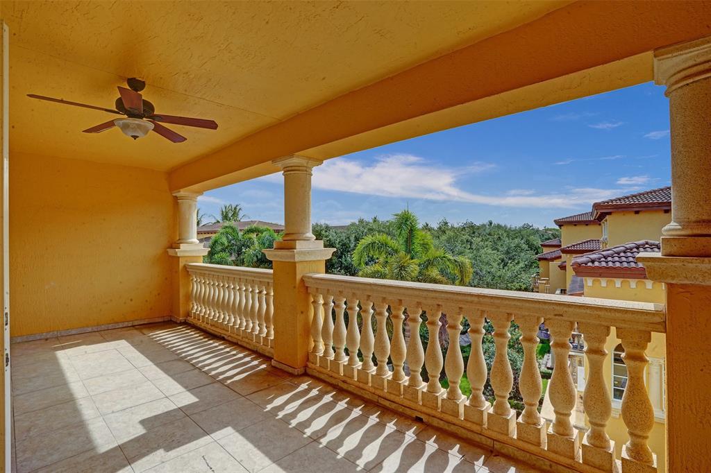 230 Northeast 69th Circle, Unit 230 Boca Raton, FL 33487 - Photo 46 of 91 a view of a porch with wooden floor