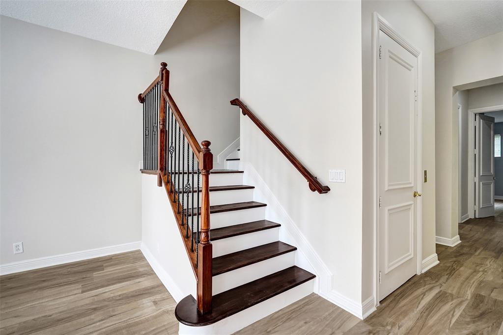 230 Northeast 69th Circle, Unit 230 Boca Raton, FL 33487 - Photo 49 of 91 a view of entryway with wooden floor
