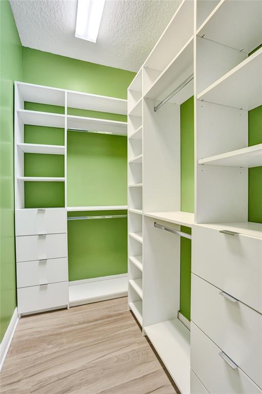 230 Northeast 69th Circle, Unit 230 Boca Raton, FL 33487 - Photo 78 of 91 a view of an empty room with empty shelves
