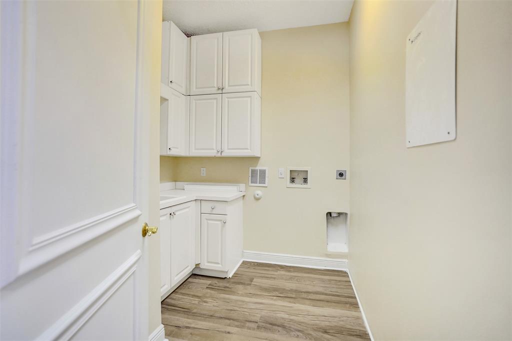 230 Northeast 69th Circle, Unit 230 Boca Raton, FL 33487 - Photo 79 of 91 a bathroom with a sink and a refrigerator