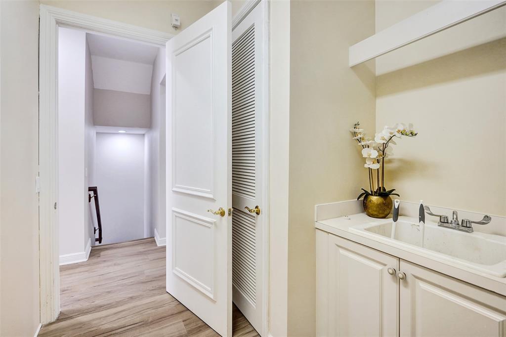 230 Northeast 69th Circle, Unit 230 Boca Raton, FL 33487 - Photo 80 of 91 Spacious Walk-In Laundry Features Lower + Upper Cabinetry + Wash Sink...