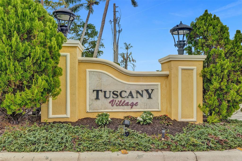 230 Northeast 69th Circle, Unit 230 Boca Raton, FL 33487 - Photo 90 of 91 a sign on the side of a building