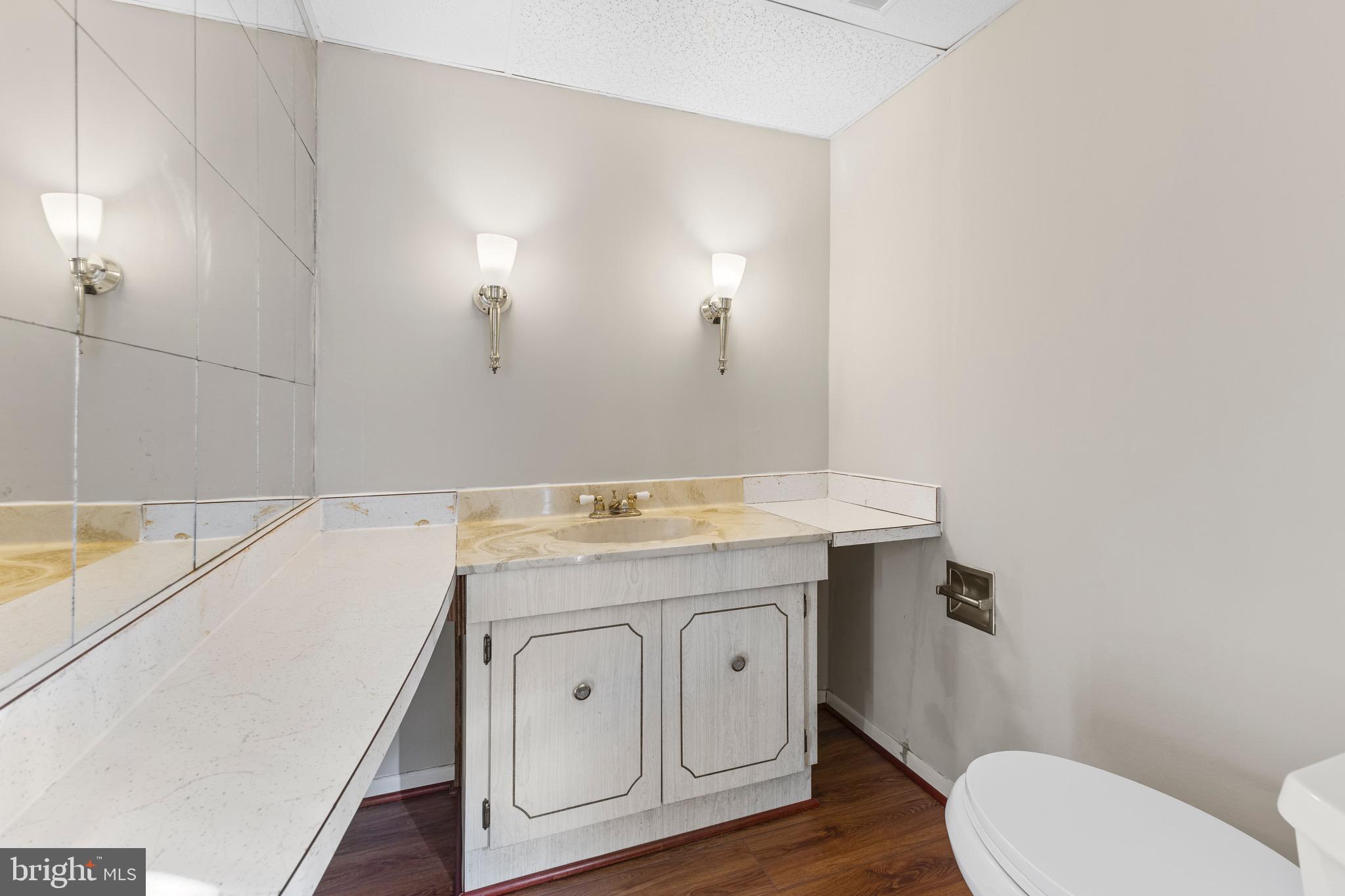 412 Vierling Drive Silver Spring, MD 20904 - Photo 26 of 35 a bathroom with a sink a toilet and vanity