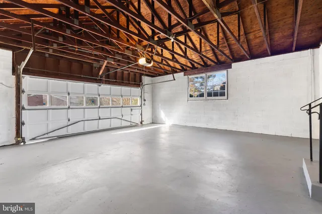 a view of a room with wooden walls